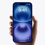 Close-up of a hand holding a smartphone with a blue gradient wallpaper and two app icons at the bottom edge.