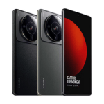 Three smartphones lined up side by side showing prominent camera modules; black, gray, and a device with a red-accented screen visible on the right.
