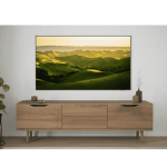 Living room scene with a long wooden sideboard and a large framed landscape painting of green rolling hills above it.