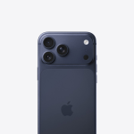 Back of a dark blue iPhone showing its triple camera array, flash, and Apple logo, close-up.